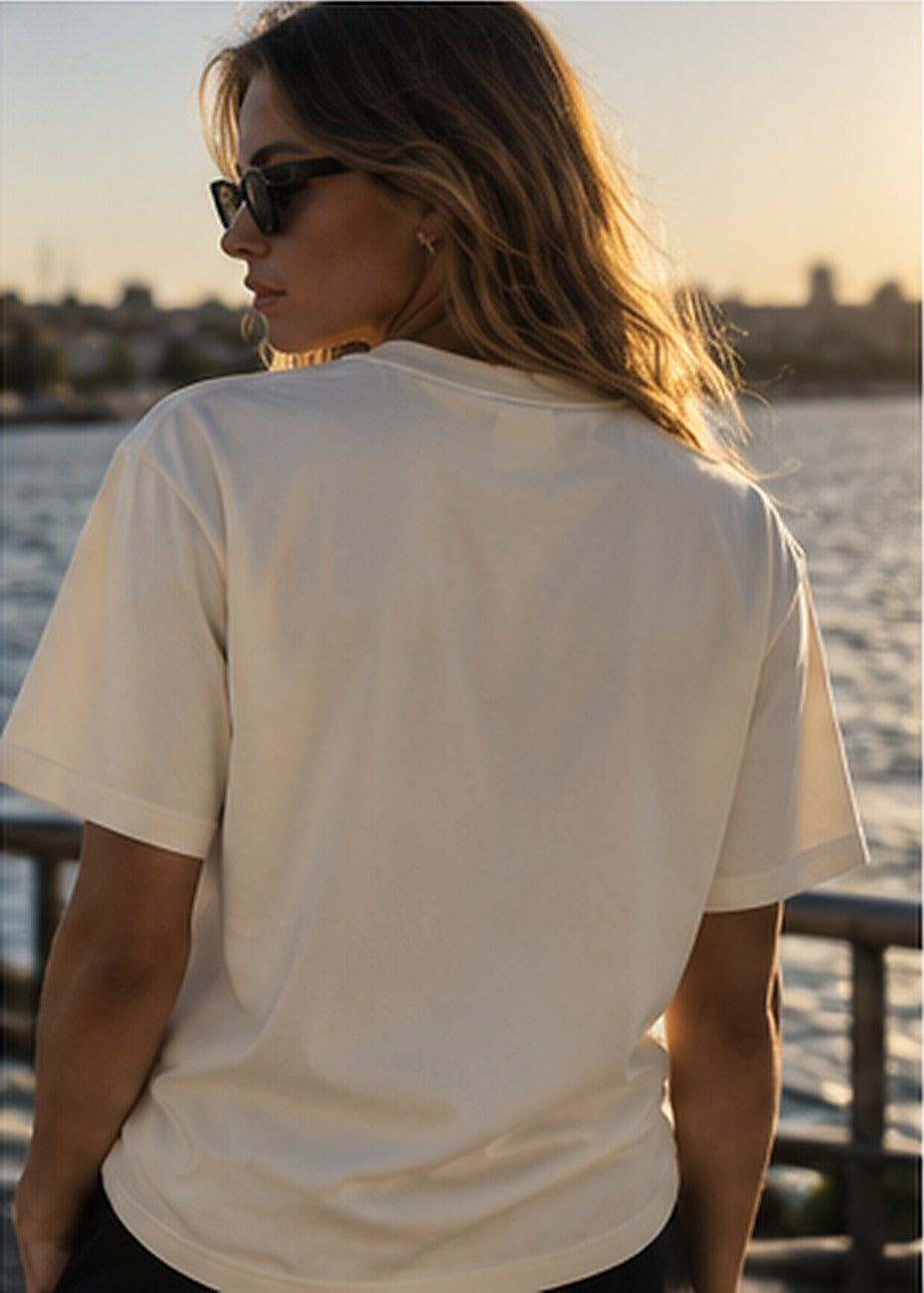Hard to Get tee in Cream, plain back, worn by a model